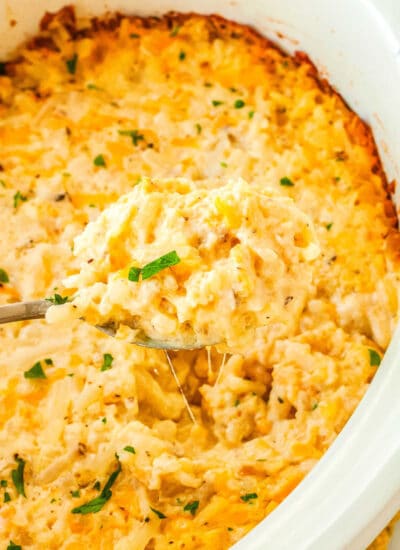 a crockpot with Cracker Barrel Hashbrown casserole in it