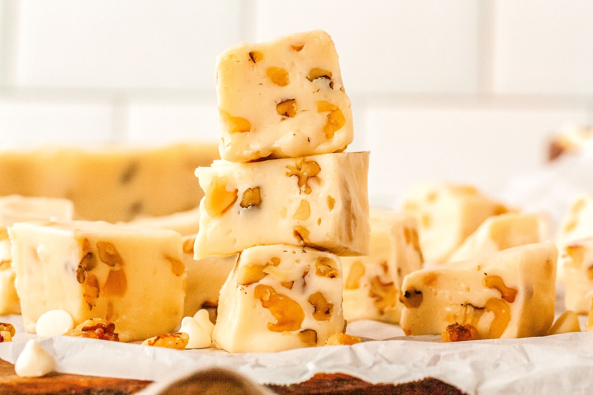 a stack of vanilla fudge pieces on a tray